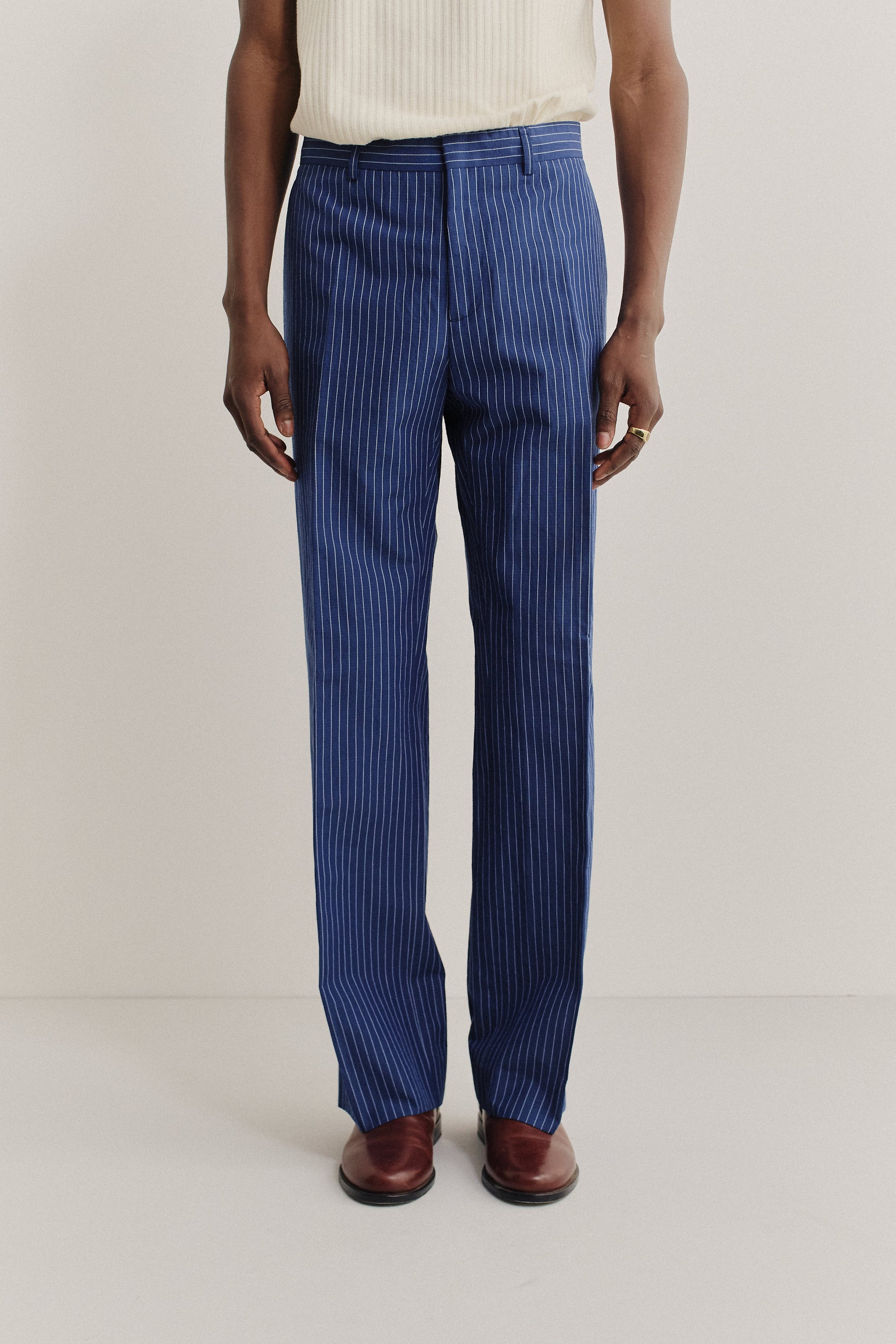 Men's long pants, cotton-linen seersucker, pinstriped navy, tailored wide-leg.