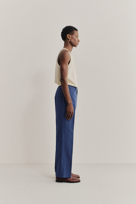 Men's long-pants, cotton-linen seersucker, pinstriped navy, wide-leg, pressed pleat.