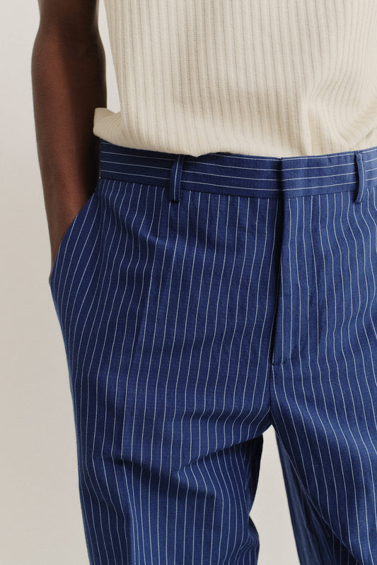 Men's long-pants, cotton-linen seersucker, navy with white pinstripes, tailored wide-leg.