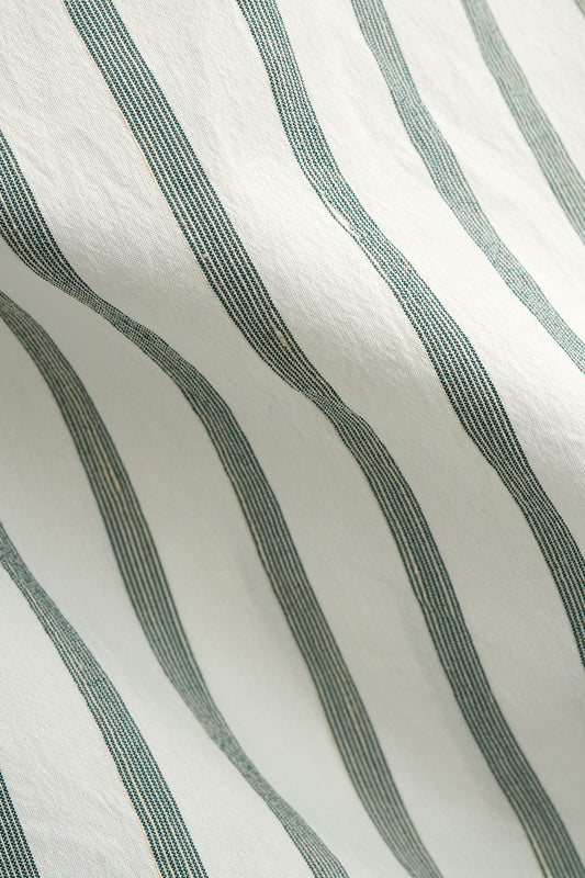 Men's short-sleeved shirt, cotton-silk-linen blend, washed finish, white with subtle green stripes.