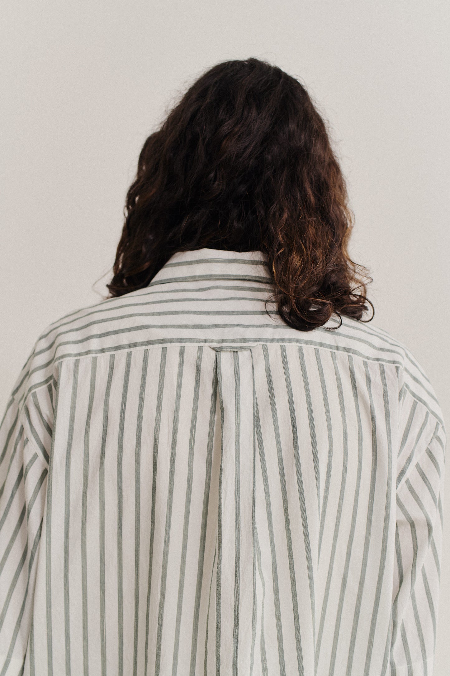 Men's short-sleeved shirt, cotton-silk-linen blend, washed, white with subtle green stripes.