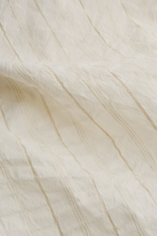Men's short-sleeved shirt, cotton-silk-linen blend, washed finish, off-white with subtle striped texture.