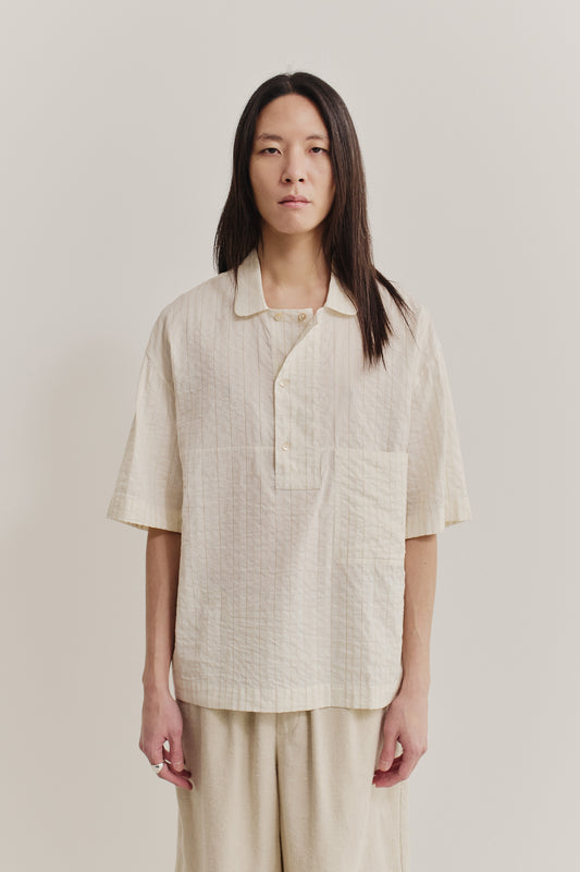 Men's short-sleeved shirt, cotton-silk-linen blend, washed, cream with subtle stripes.