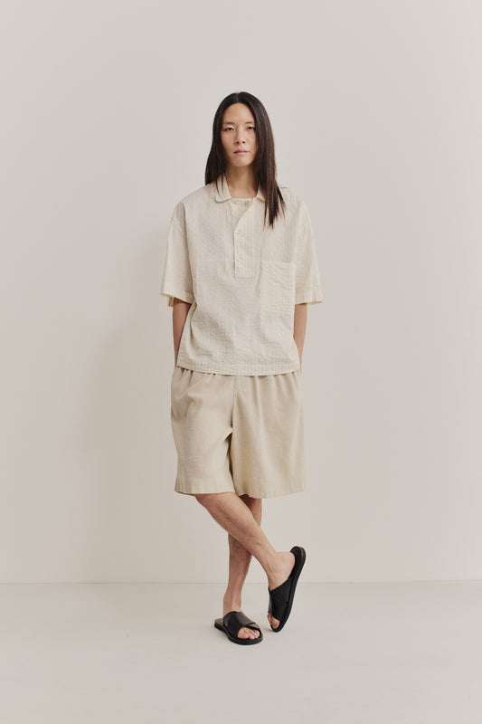 Men's short-sleeved shirt, cotton-silk-linen blend, washed, light beige with subtle stripes.