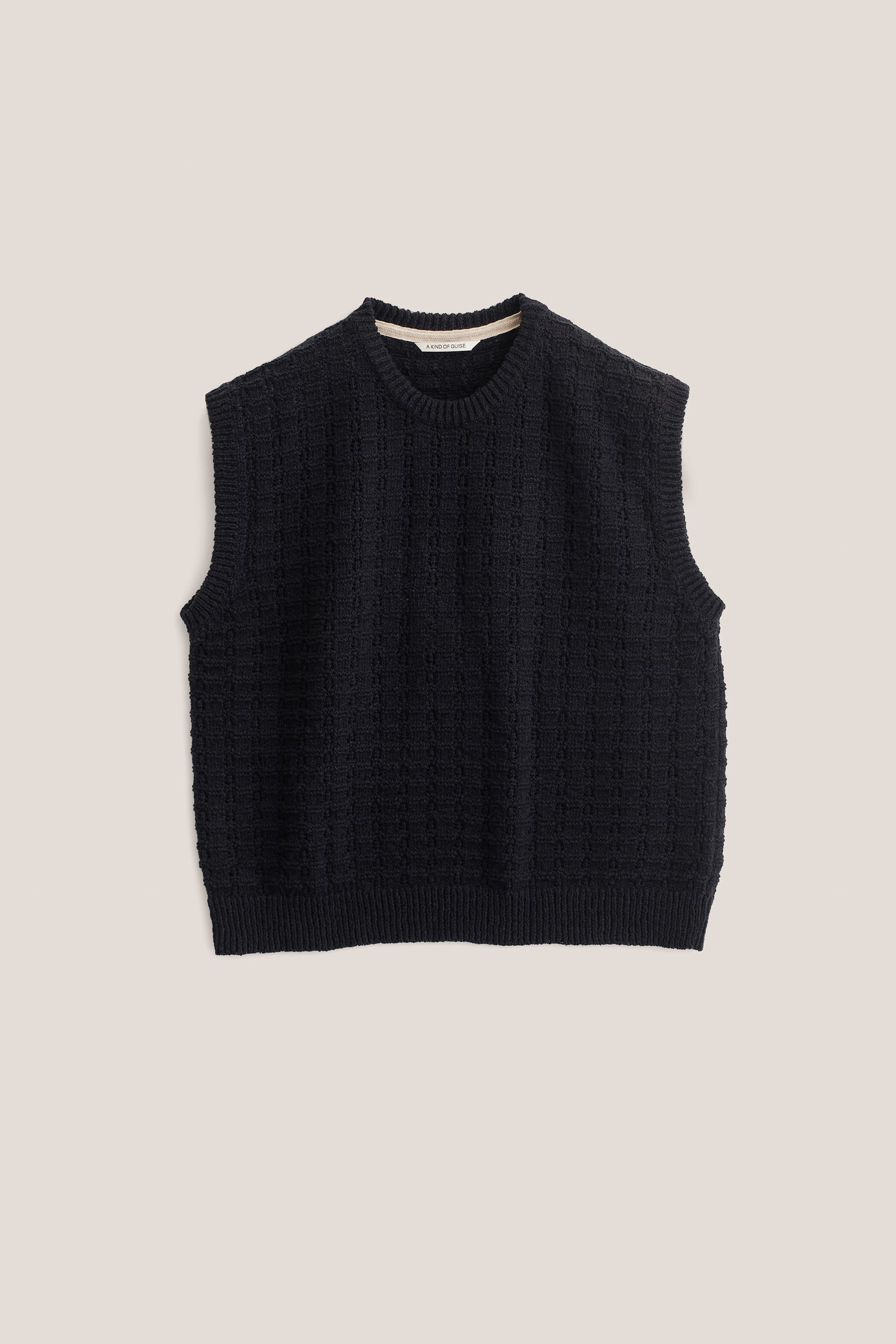 Men's knit vest, organic cotton-wool bouclé, black, openwork knit, slightly boxy silhouette.
