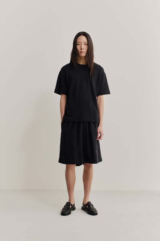 Men's jersey short-sleeved shirt, organic cotton mix, black, with dropped shoulders and boxy fit.
