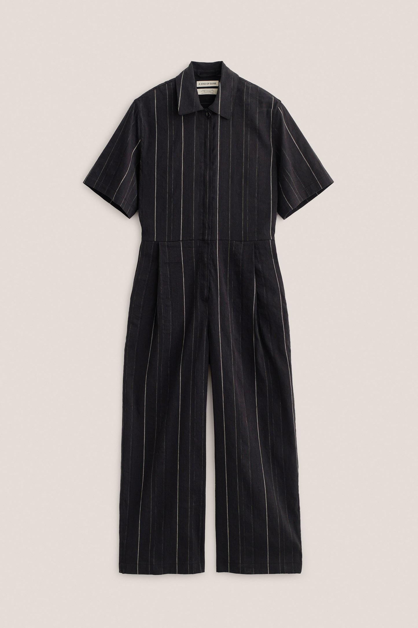 Women's jumpsuit, short-sleeved, black cotton-linen blend with white stripes, lay-down collar, wide leg.