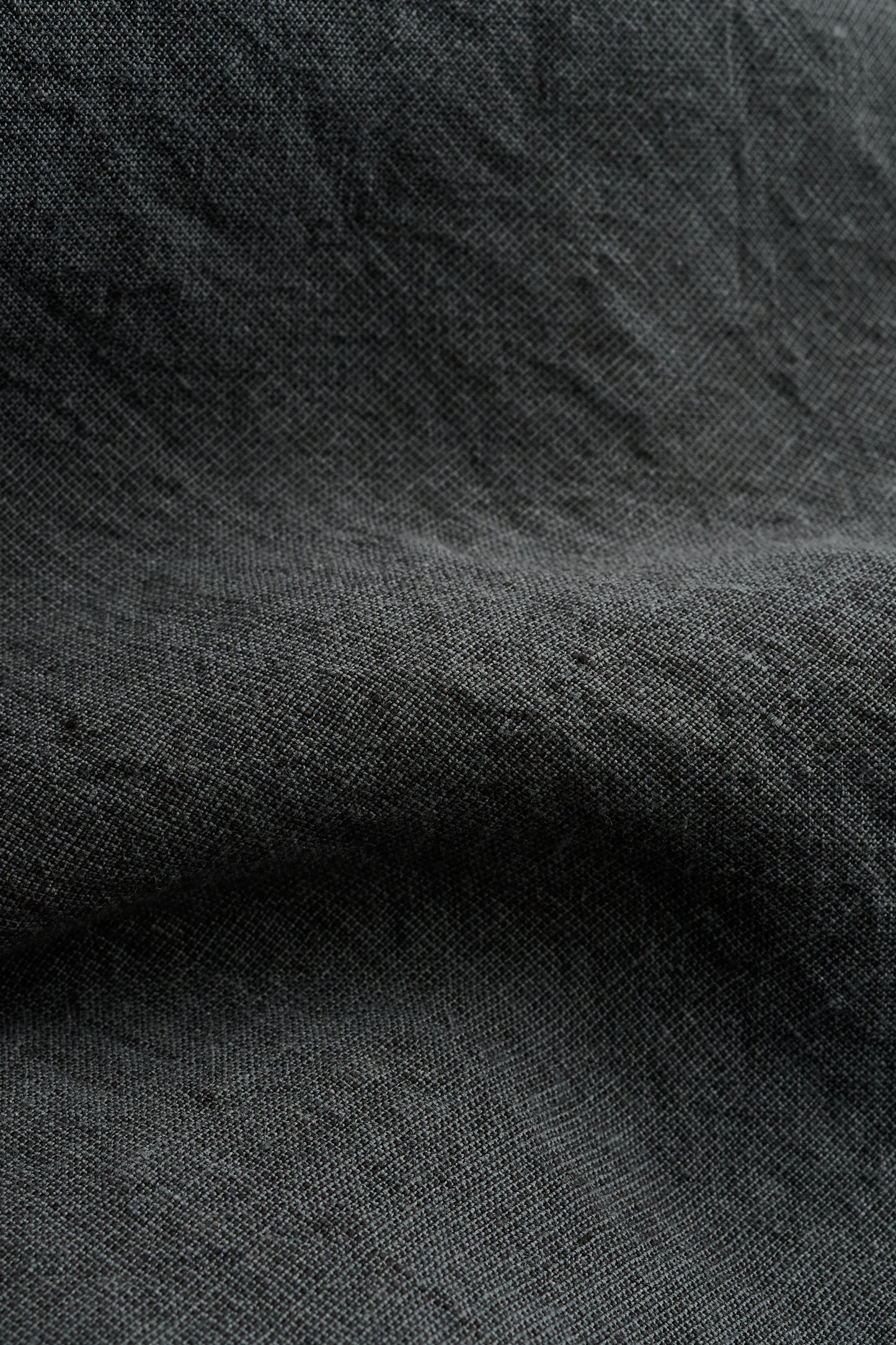 Men's shorts, linen, vintage-like texture, dark grey.
