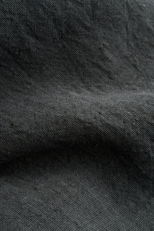 Men's shorts, linen, vintage-like texture, dark grey.