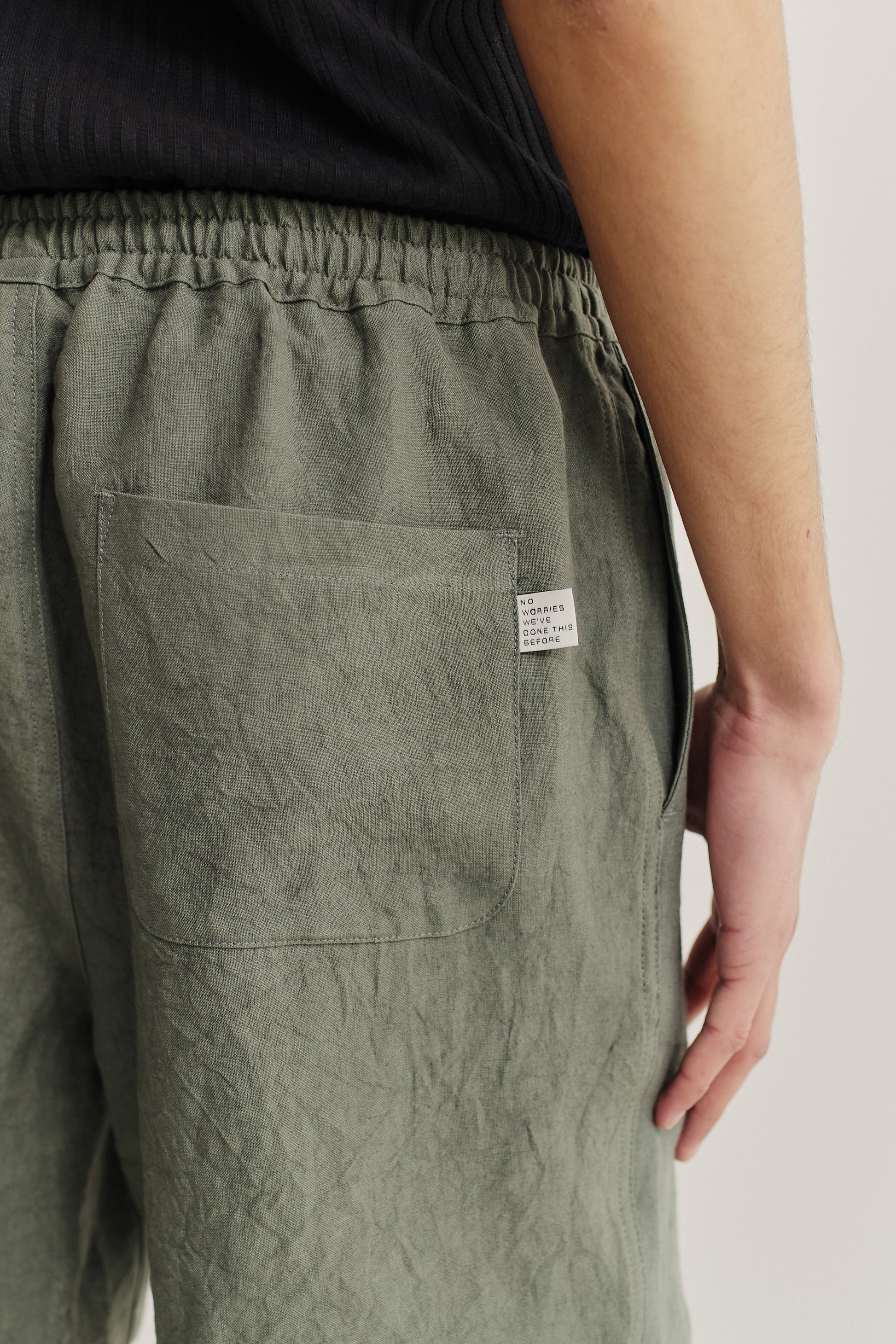 Men's shorts, Japanese linen, sun-dried, olive green, with back patch pocket and elastic waist.