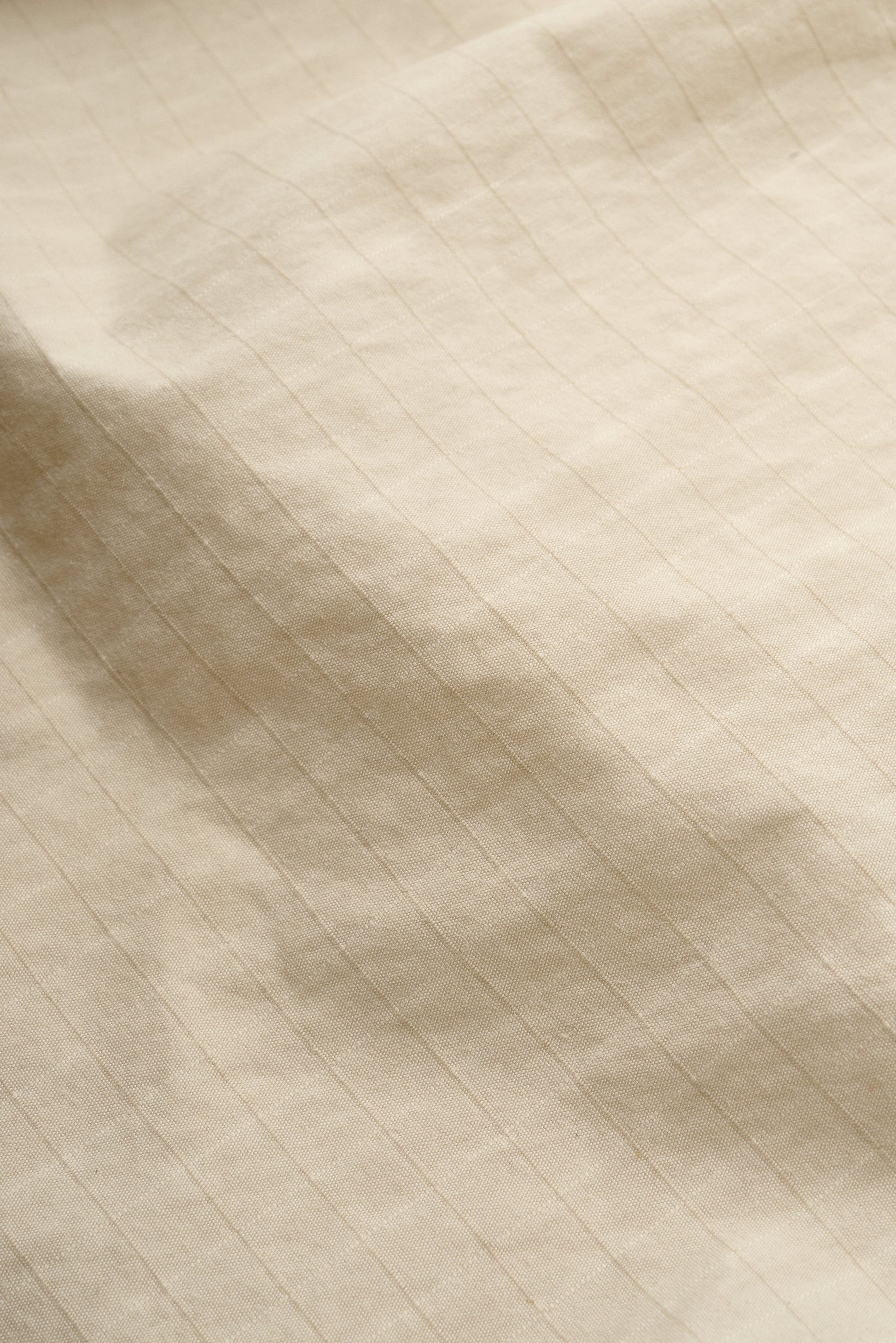 Men's shorts, cotton blend ripstop, waxed finish, beige.