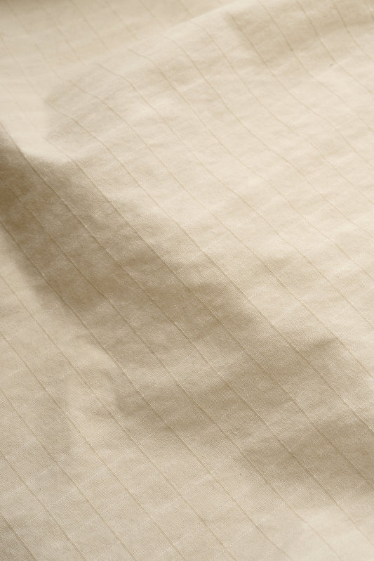 Men's shorts, cotton blend ripstop, waxed finish, beige.