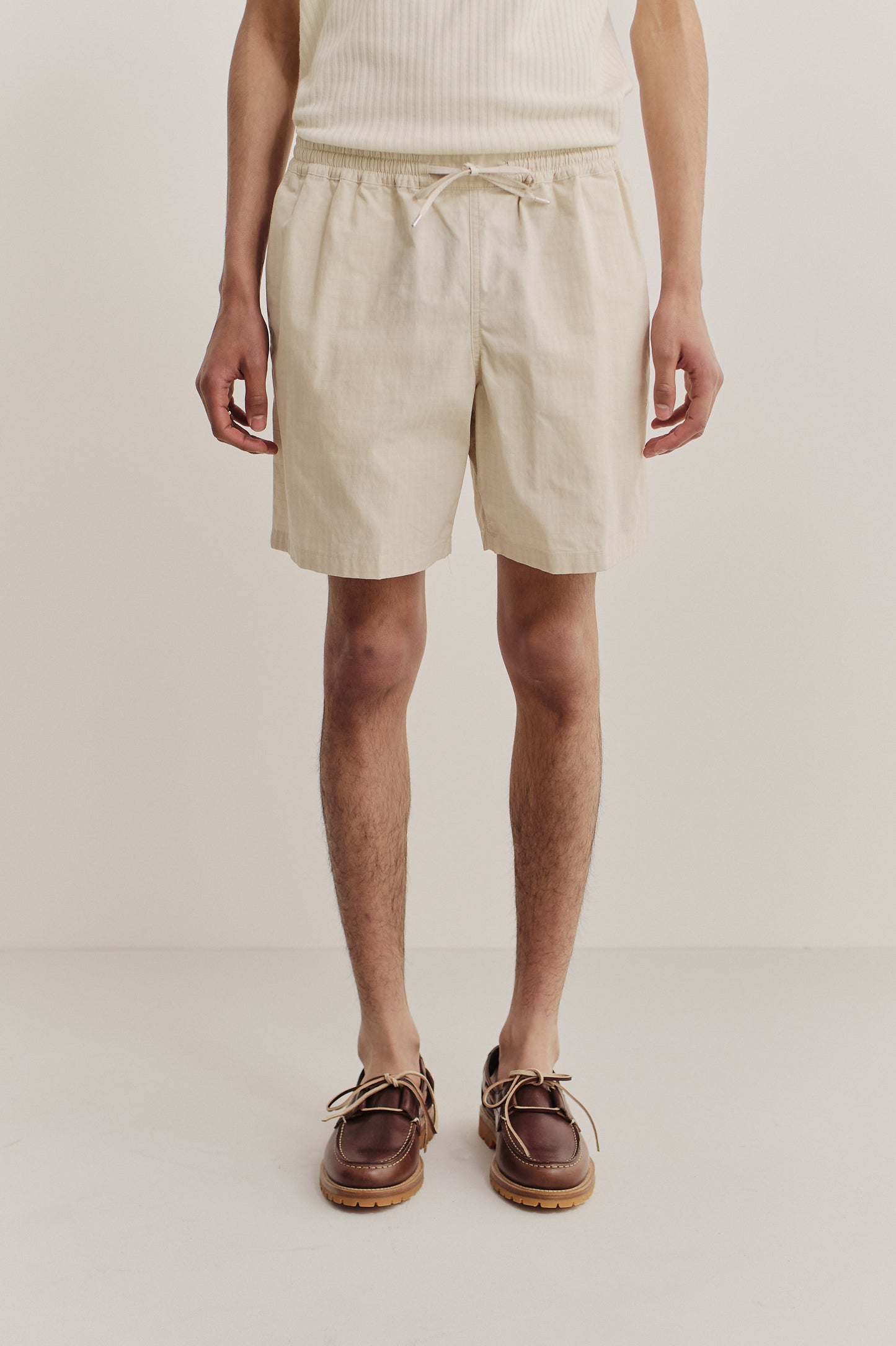 Men's shorts, cotton blend ripstop, natural beige, with adjustable drawstring waist and side pockets.