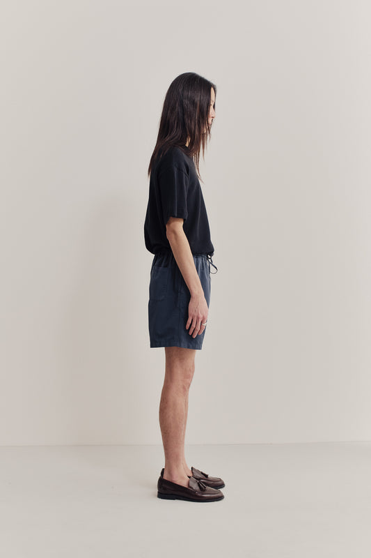 Men's shorts, cotton-linen blend, garment-dyed navy, with adjustable waistband and side pockets.
