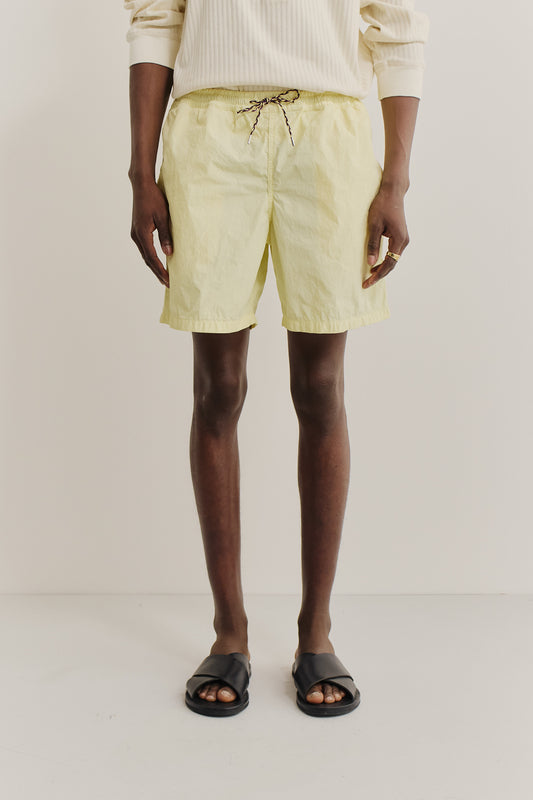 Men's shorts, recycled polyamide, garment-dyed light yellow, with pull cords.
