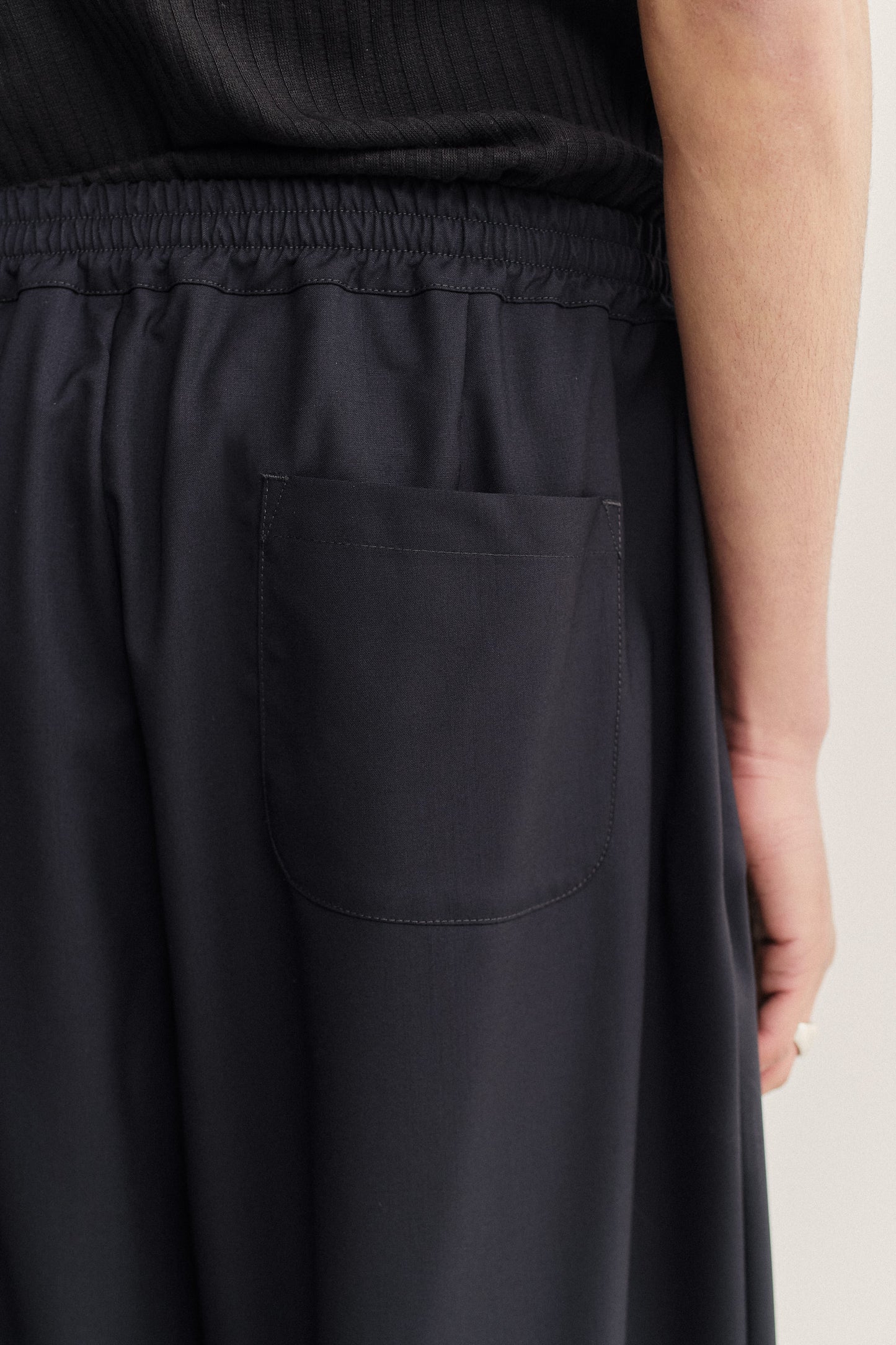 Unisex long-pants, virgin wool mohair blend, dark navy, elastic waistband, back patch pocket.