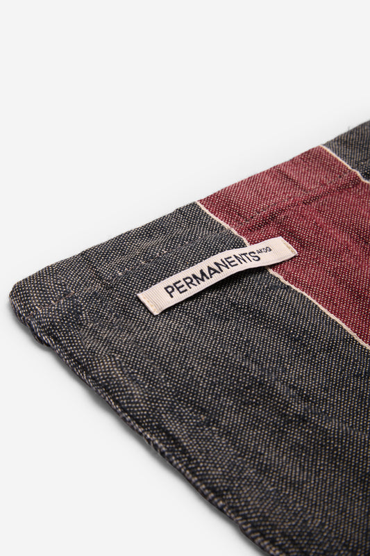 Accessories beach towel, linen-cotton mix, red and navy stripe, with "PERMANENTS" label.