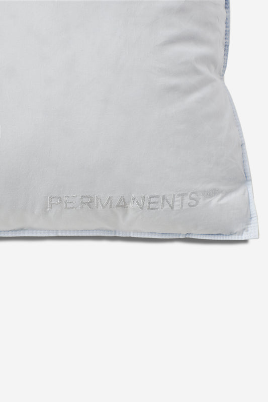 White Eiderdown Pillow with "PERMANENTS" embroidered, featuring light blue piping.