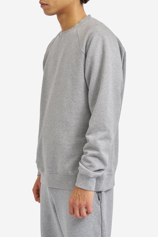 Men's knit sweater, long-sleeved, 100% organic cotton, pre-washed, grey melange, raglan sleeves.