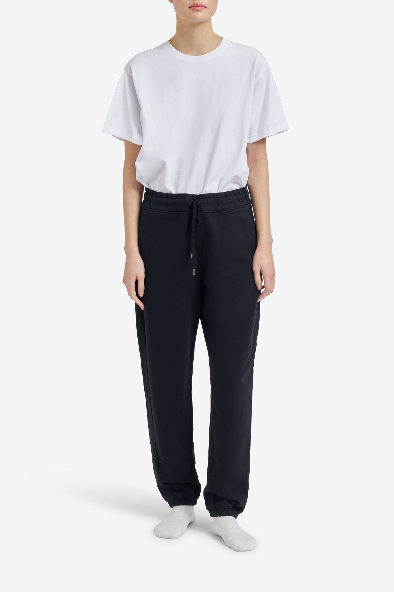 Women's jersey long-pants, organic cotton, black, with drawstring waist and embroidered logo.